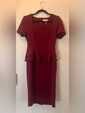 Red peplum midi 1950s style dress